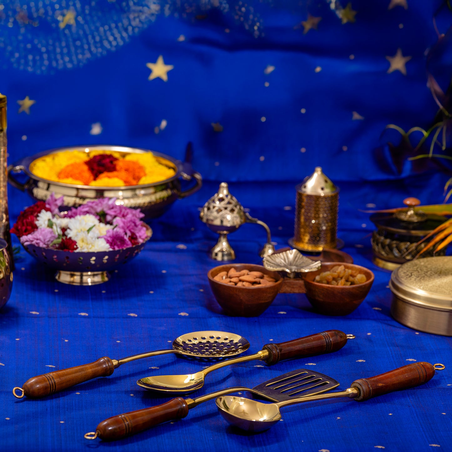 brass ladles set for cooking and serving in traditional kitchens  