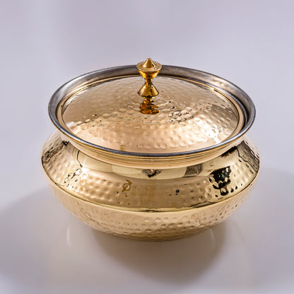 traditional brass patili for authentic indian cooking