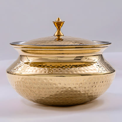 traditional brass patili for authentic indian cooking