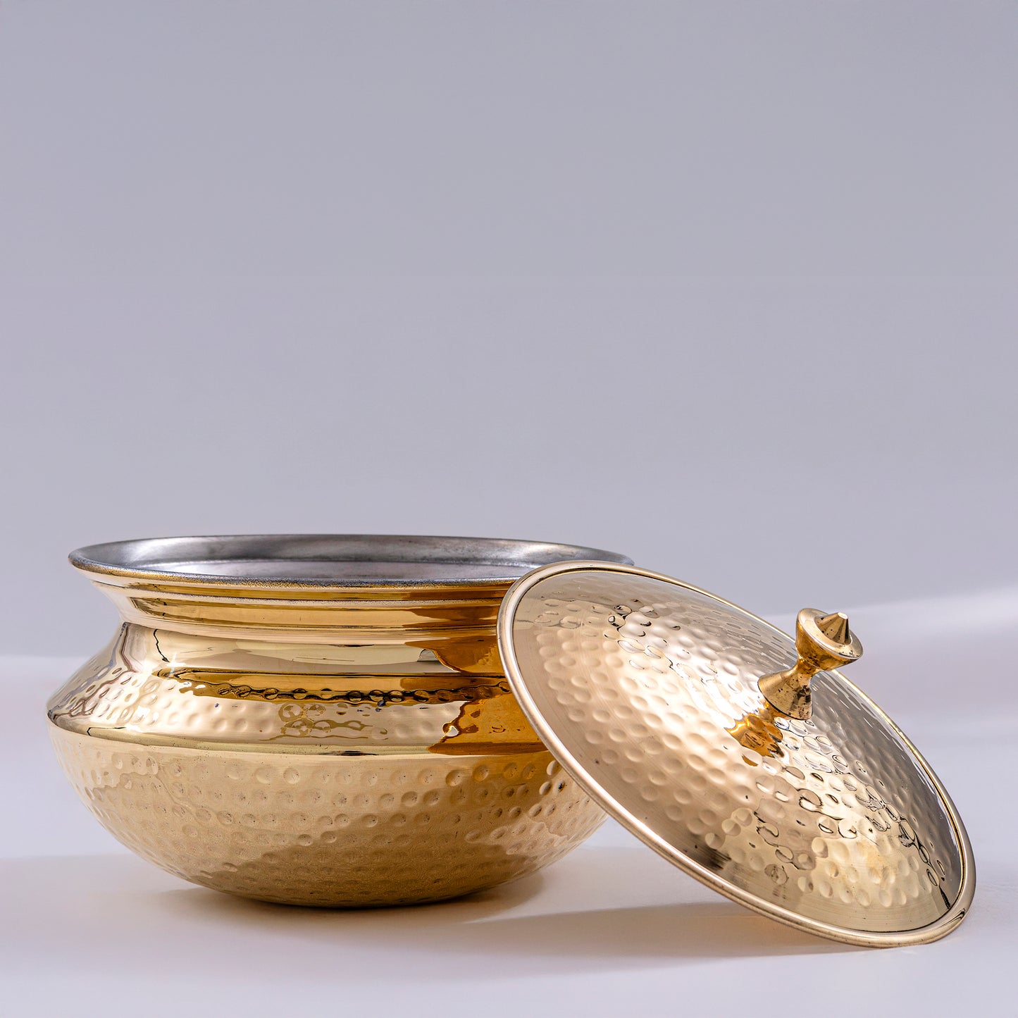 traditional brass patili for authentic indian cooking