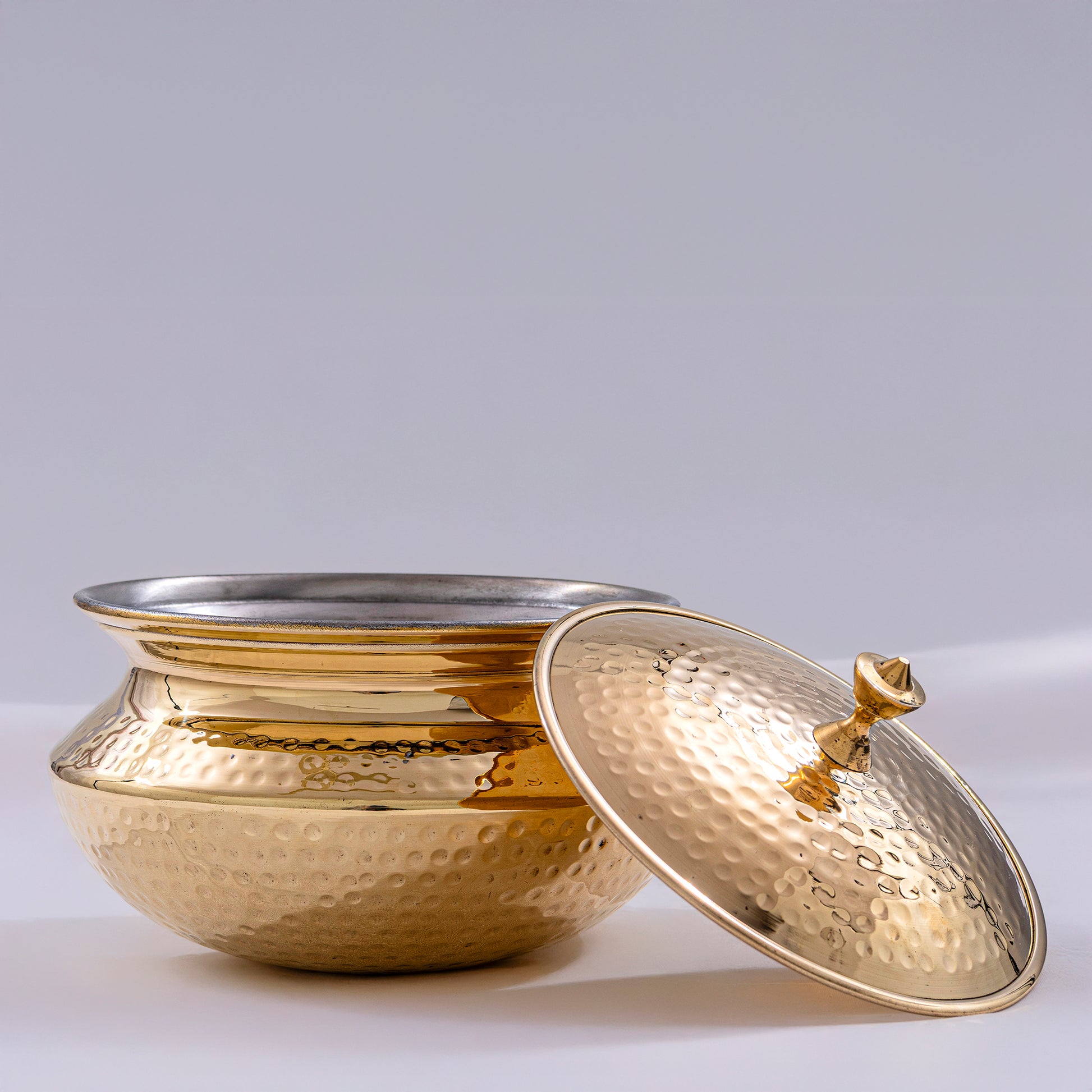 traditional brass patili for authentic indian cooking