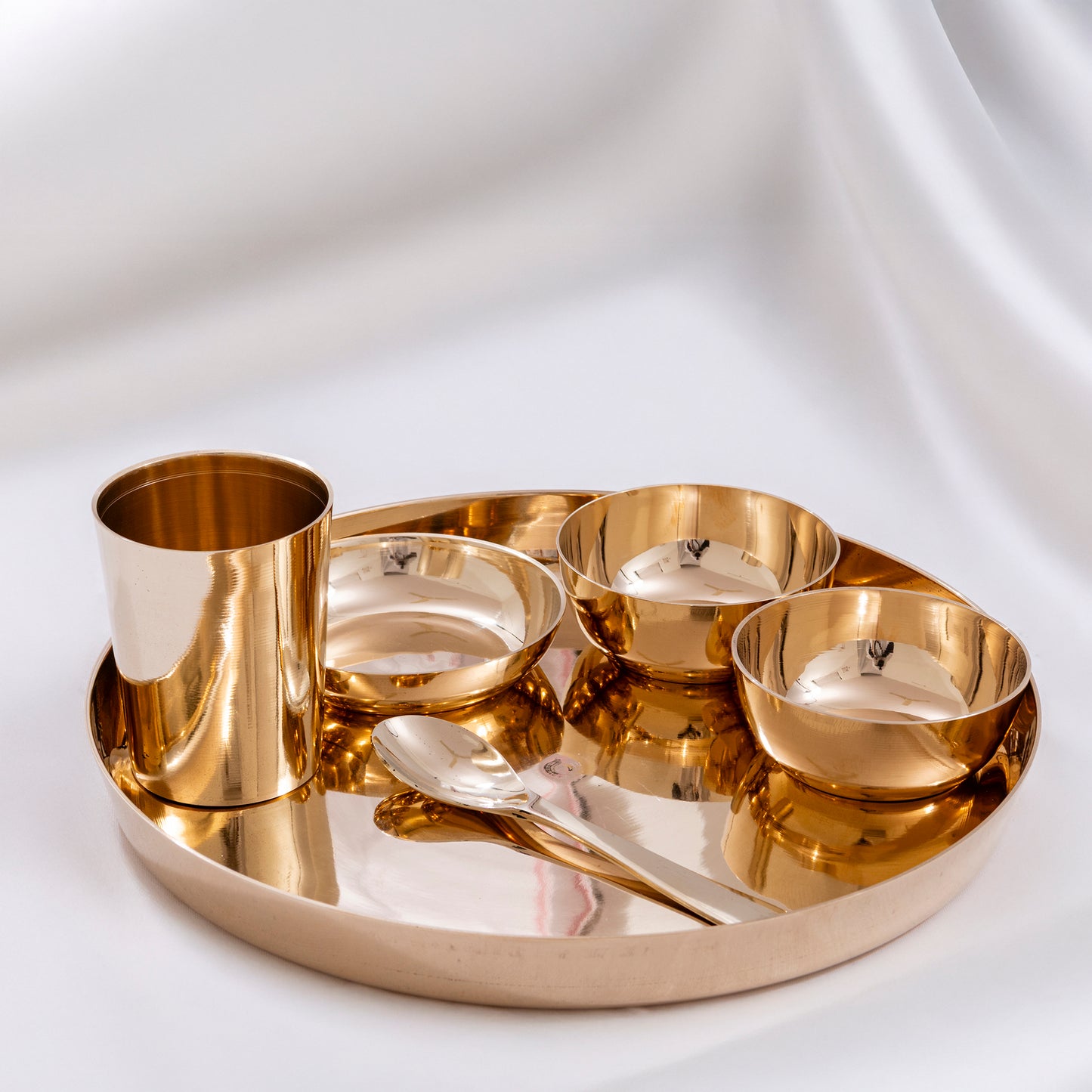handcrafted bronze dinner set for traditional dining and premium table setting