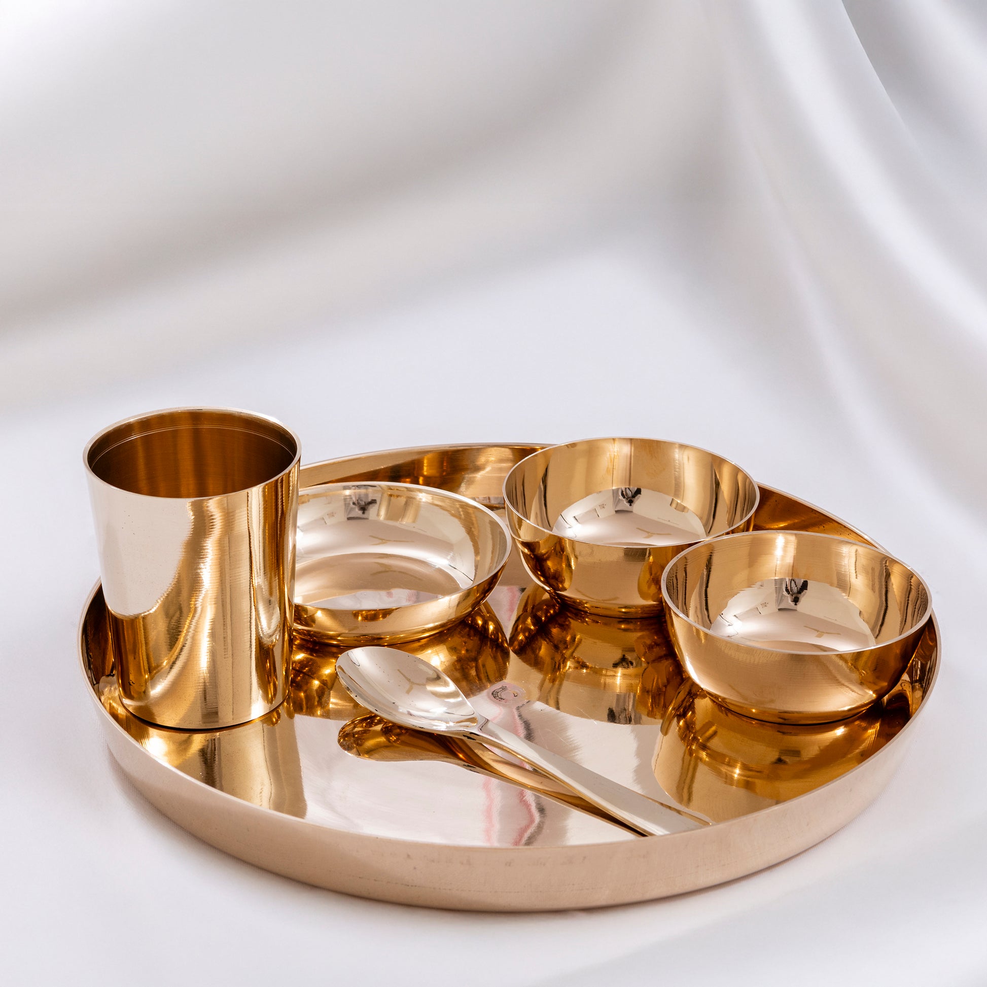 handcrafted bronze dinner set for traditional dining and premium table setting