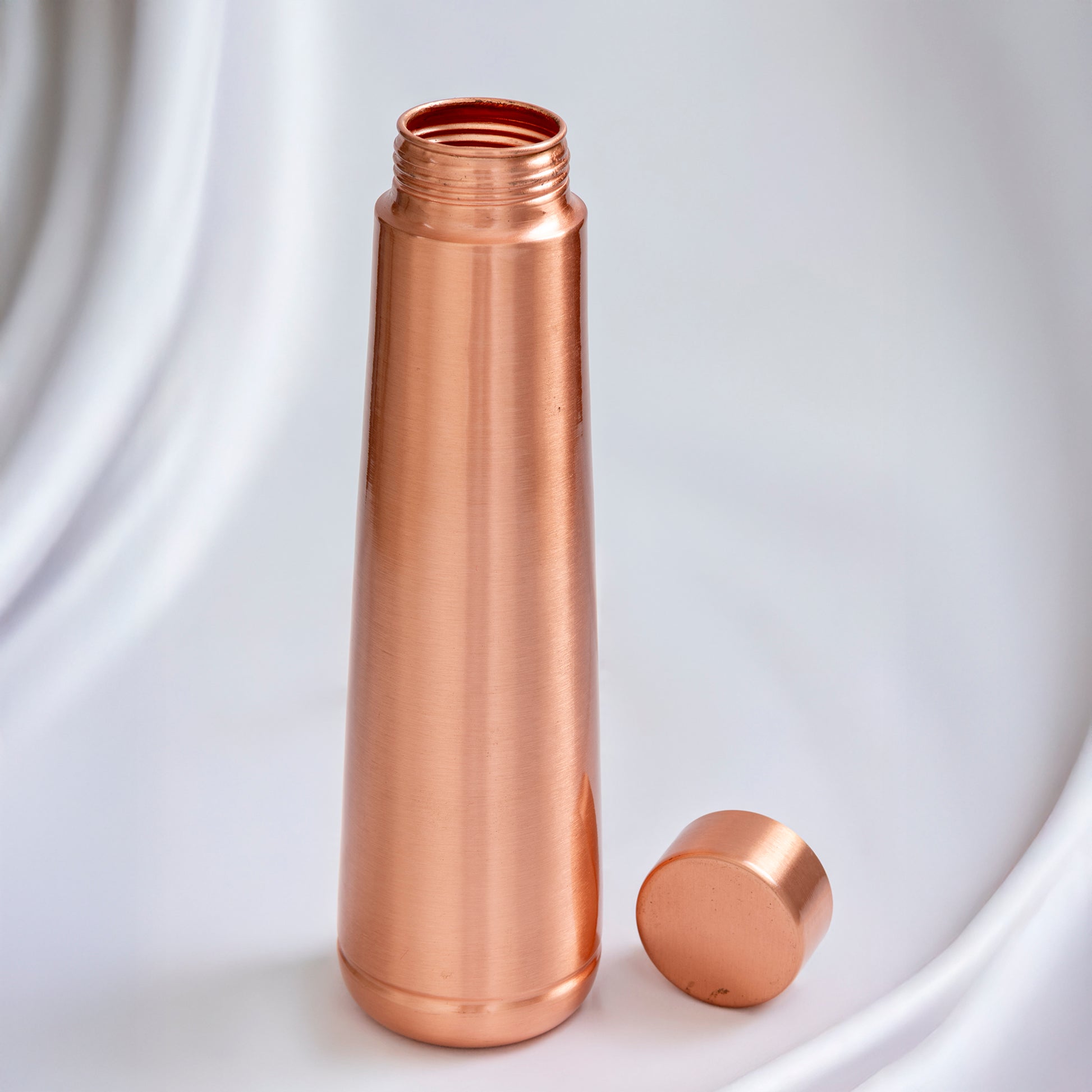 pure copper water bottle inspired by traditional wellness practices