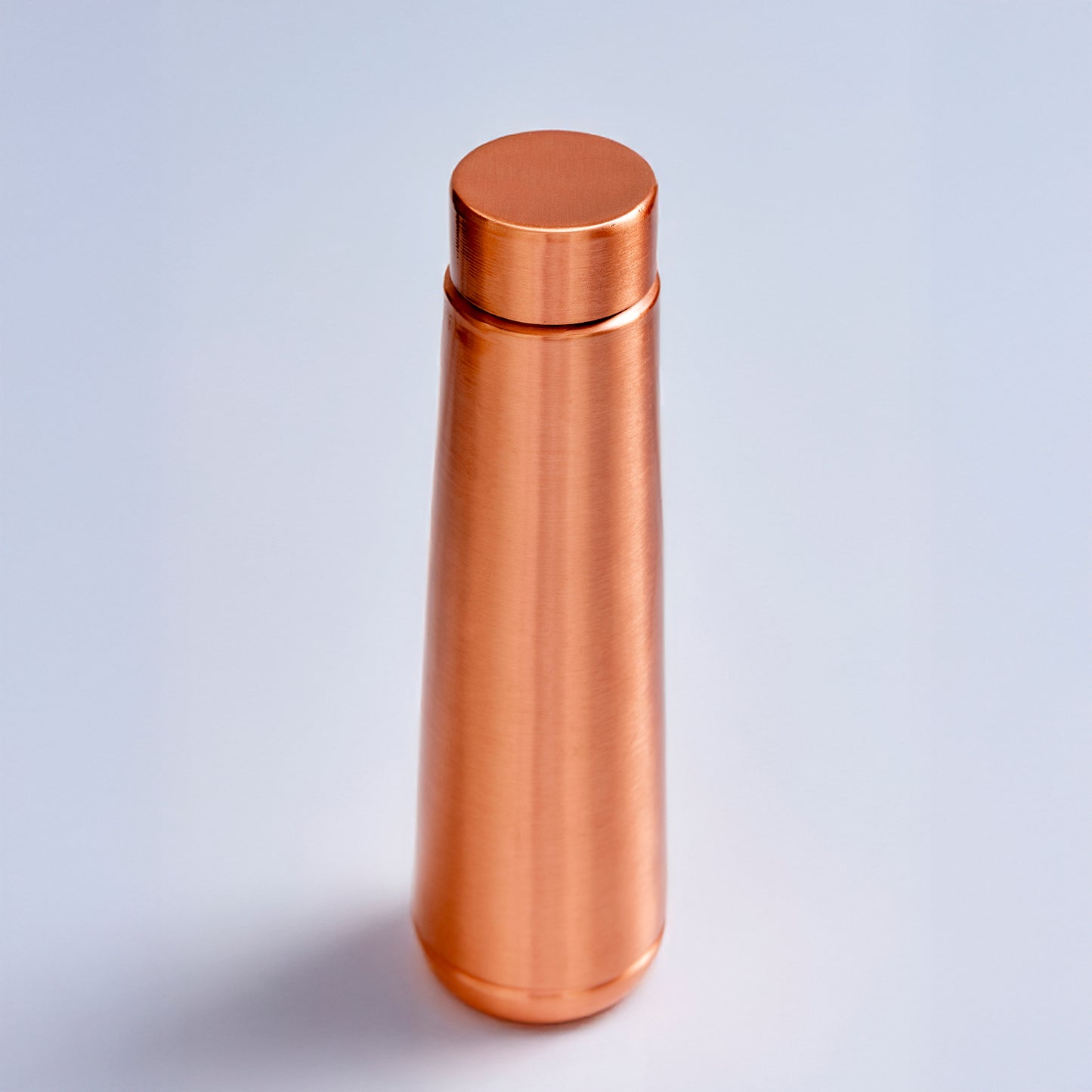 pure copper water bottle inspired by traditional wellness practices